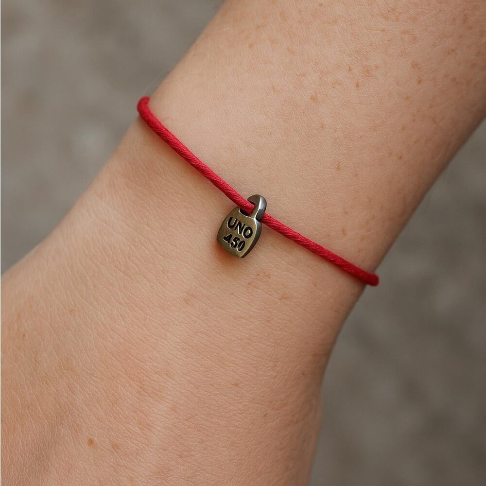 UNO de 50 Red Cord Bracelet Silver Charm Adjustable Unisex NWOT